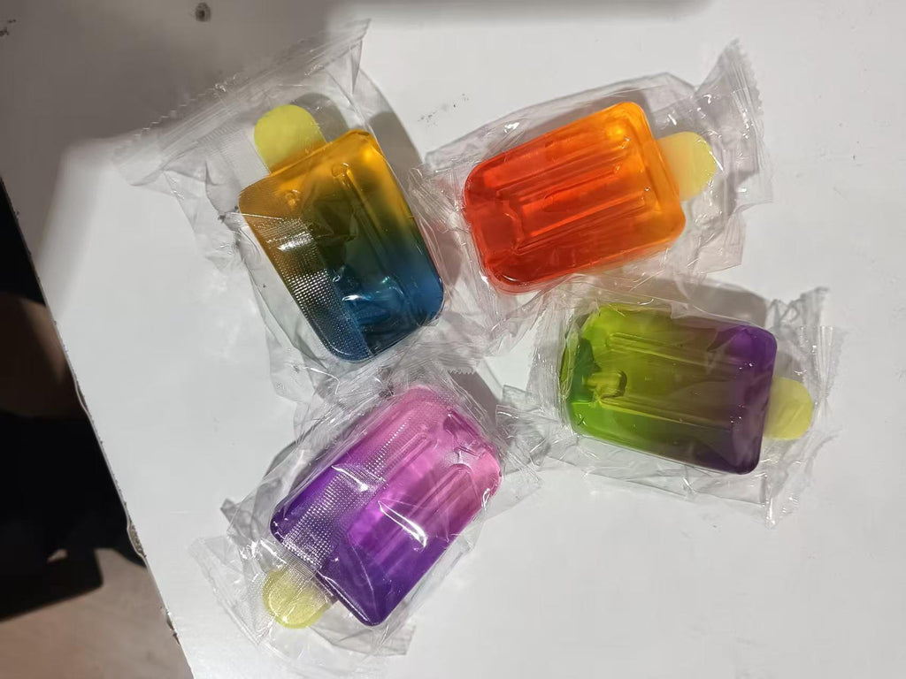 NEE DOH NICE CUBE GNIOT SQUISHY SWIRL ANTYSTRES ORANGE GUMMY ICE